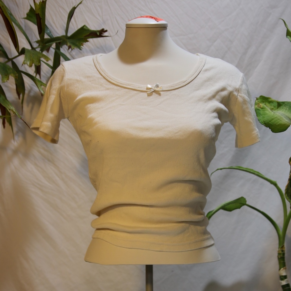 Pale yellow tee